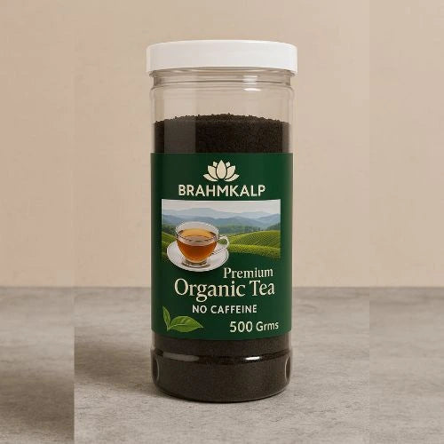 Brahmkalp Premium Organic Tea 500g jar placed on a stone surface with a natural background, featuring a no caffeine herbal tea blend.