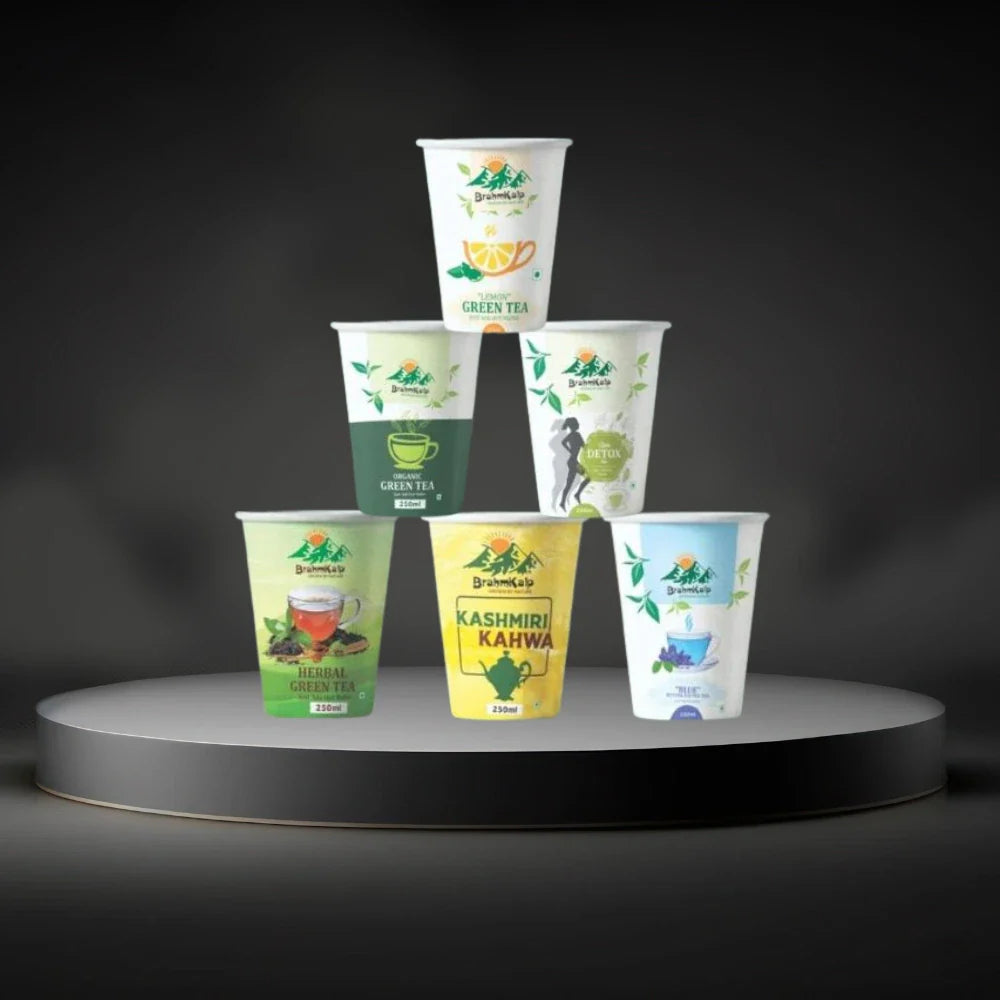 Brahmkalp Wellness Ready-to-Drink Herbal Tea Cups – 250ml servings of Green Tea, Slim Detox, Blue Tea, Kashmiri Kahwa, and Lemon Green Tea. Ideal for on-the-go health, hydration, and caffeine-free refreshment.